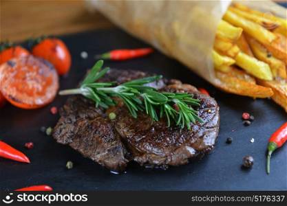 french fries and steak on plate