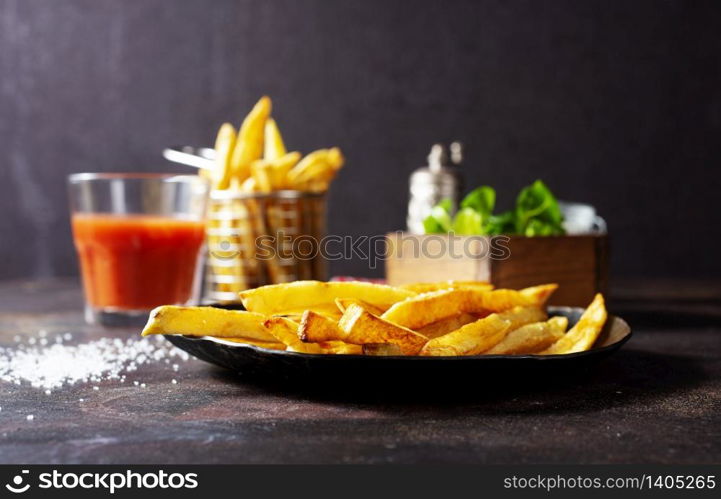 French fries, fast food, fried potato on plate