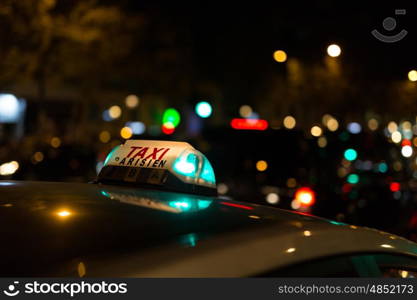 French taxi with the champs elysees avenue in background