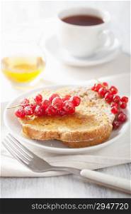 french toast with redcurrant and honey for breakfast