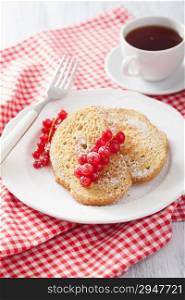 french toast with redcurrant and powder sugar for breakfast