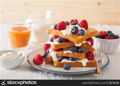 french toasts with creme fraiche and berries for breakfast