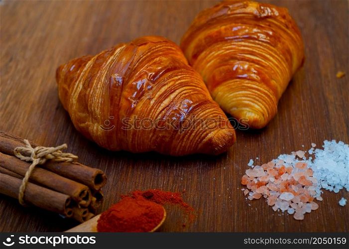 french traditiona croissant brioche butter bread on wood