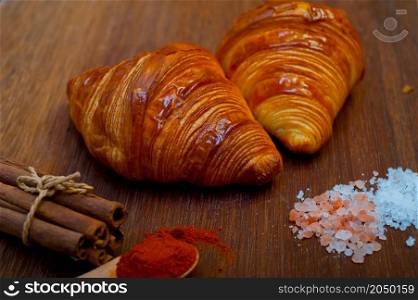 french traditiona croissant brioche butter bread on wood