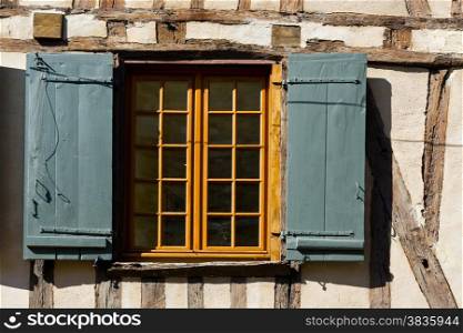 French Window with Open Wooden Shutters