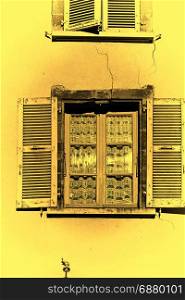 French Windows with Wooden Shutter in a Medieval City, Stylized Photo