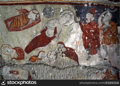 Fresco on the wall of rock church in Guzelurt in Cappadocia, Turkey