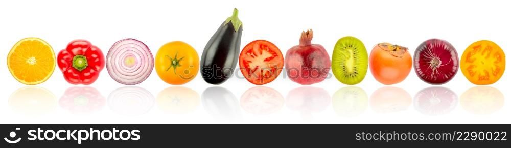 Fresh and bright fruits and vegetables in row with reflection isolated on white background