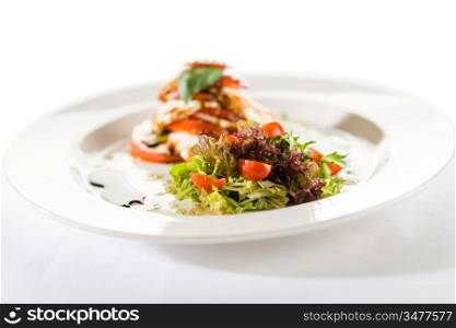 Fresh and delicious Caprese salad with tomatoes on white background