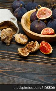 Fresh and dried Organic Fig isolated on wooden background. Fresh and dried Fig isolated on wooden background
