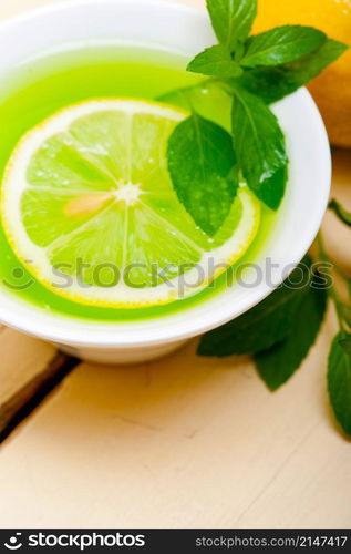 fresh and healthy mint infusion tea tisane with lemon