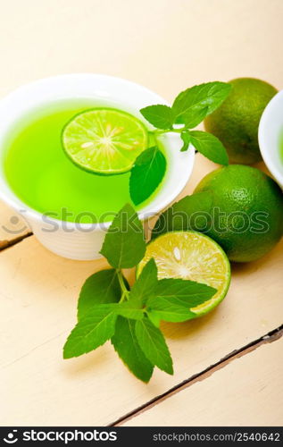 fresh and healthy mint infusion tea tisane with lime