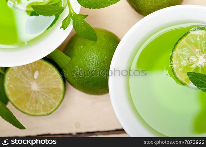 fresh and healthy mint infusion tea tisane with lime