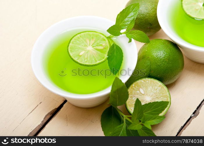 fresh and healthy mint infusion tea tisane with lime