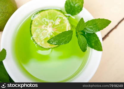 fresh and healthy mint infusion tea tisane with lime
