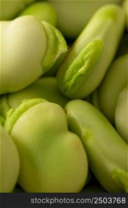 Fresh and raw green broad beans. Closeup.