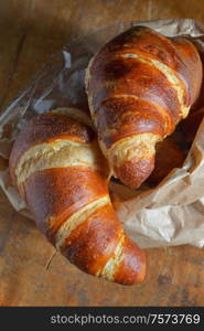 Fresh And Tasty Bavarian Croissant on Wooden Table