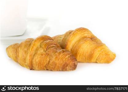 Fresh and tasty croissant on white background