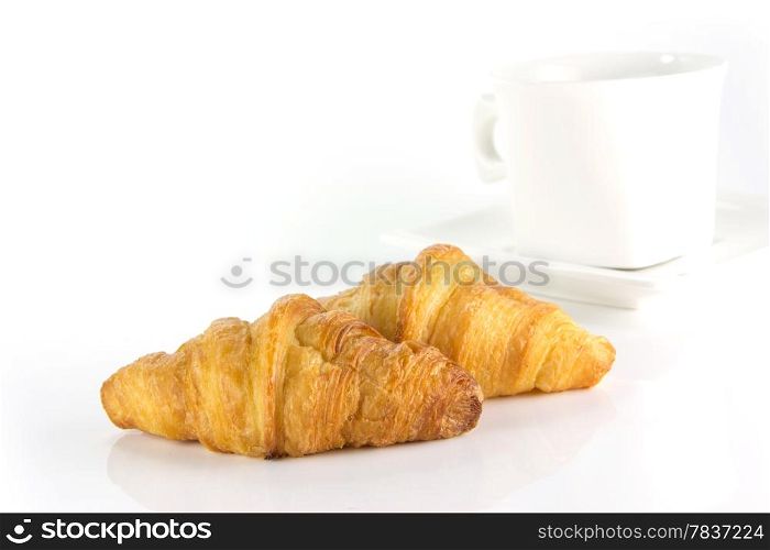 fresh and tasty croissant on white background