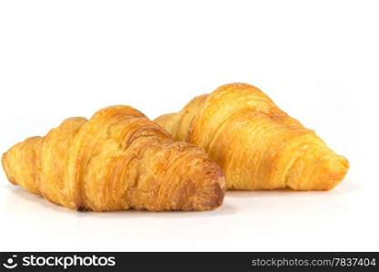fresh and tasty croissant on white background