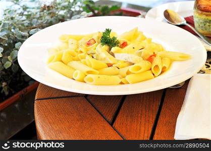 fresh and tasty macaroni served on plate