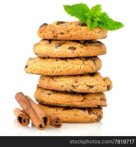 Fresh and tasty oat biscuits with cinnamon sticks on white background.