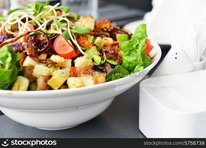 Fresh and tasty salad on plate