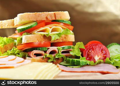 Fresh and tasty sandwich on wooden table