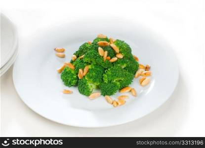 fresh and vivid sauteed broccoli and almonds very ealthy food