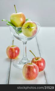fresh apple with glass . fresh red and yellow apple with glass on wooden background