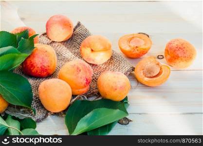 Fresh apricots picked straight from tree in the garden put on wooden table