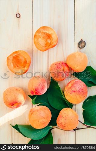 Fresh apricots picked straight from tree in the garden put on wooden table