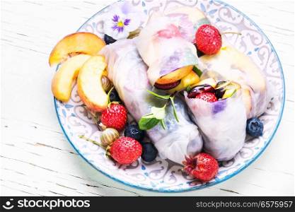 Fresh assorted Japanese summer rolls set with fruits.Vegan food. Fruit spring rolls