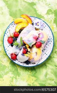Fresh assorted summer rolls set with fruits.Healthy food. Delicious Japanese spring roll