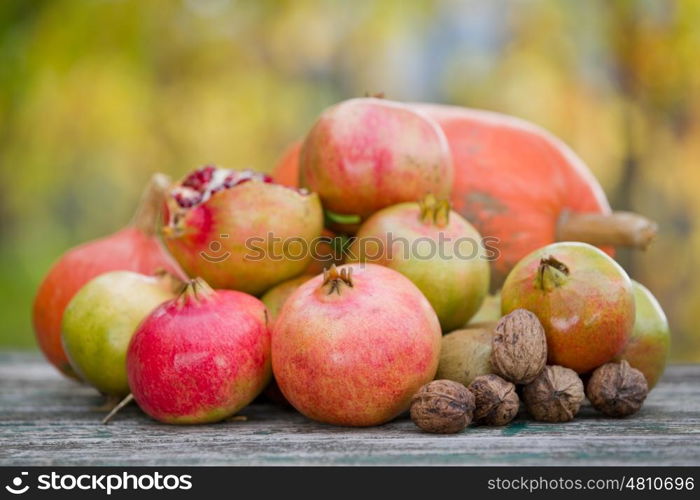 Fresh autumn fruits,on a wooden table