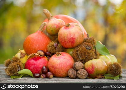 Fresh autumn fruits,on a wooden table