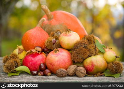 Fresh autumn fruits,on a wooden table