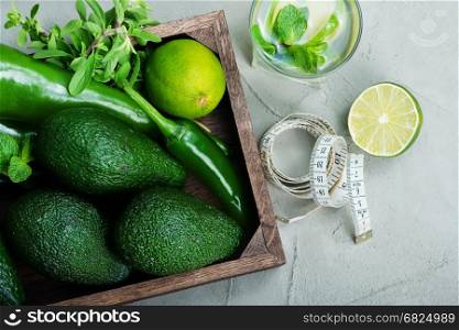 fresh avocado in box and on a table
