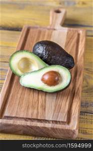 Fresh avocado on the wooden board
