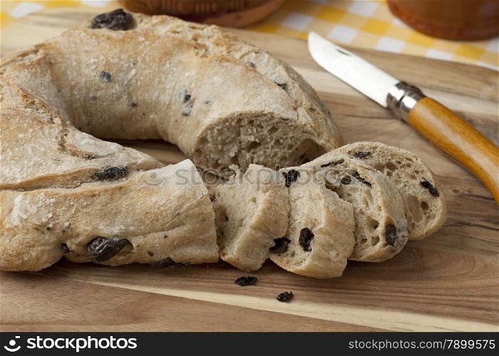 Fresh baked black olive bread and slices