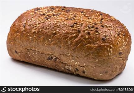 fresh baked bread with seeds on white background