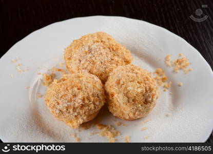 fresh baked cupcake closeup on a white plate