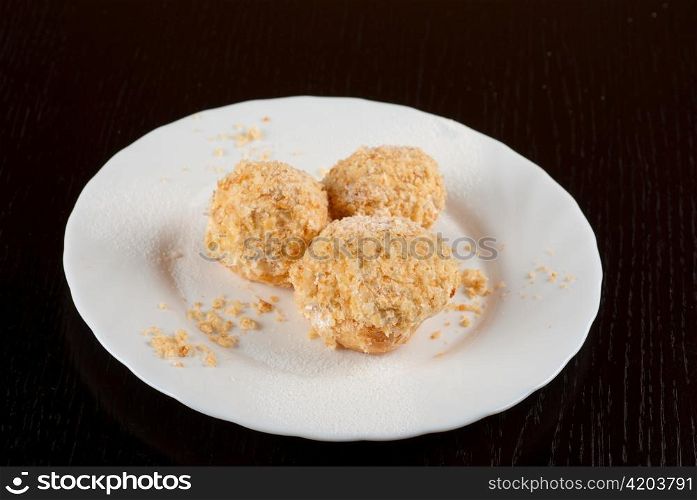fresh baked cupcake closeup on a white plate