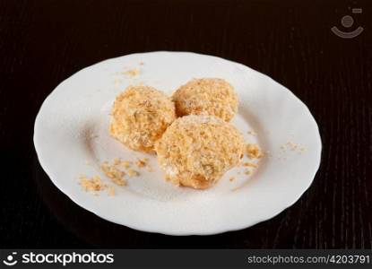 fresh baked cupcake closeup on a white plate
