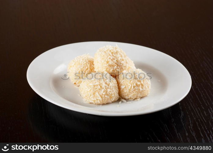 fresh baked cupcake closeup on a white plate