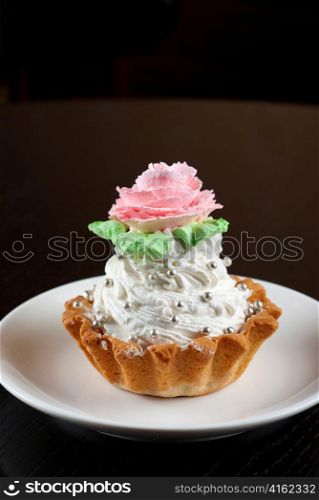 fresh baked cupcake on a wooden table