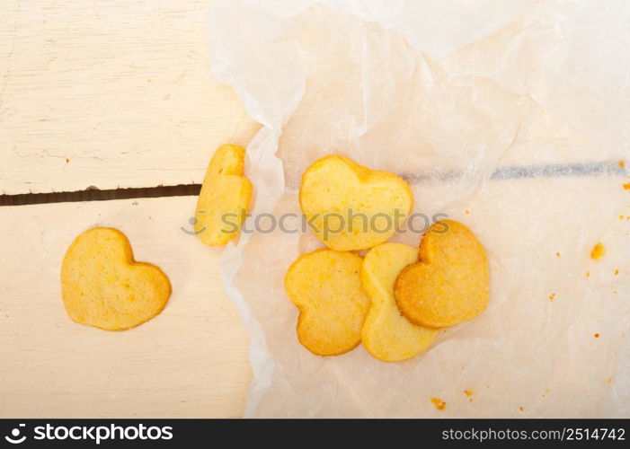 fresh baked heart shaped shortbread valentine day cookies on a paper wrap