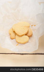 fresh baked heart shaped shortbread valentine day cookies on a paper wrap