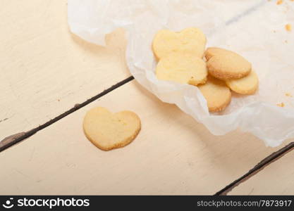 fresh baked heart shaped shortbread valentine day cookies on a paper wrap