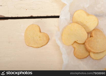 fresh baked heart shaped shortbread valentine day cookies on a paper wrap